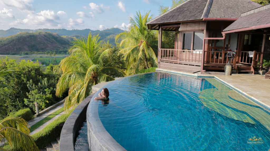 five star resorts in Bali with a high-elevation infinity pool overlooking lush mountains and jungle ridgelines