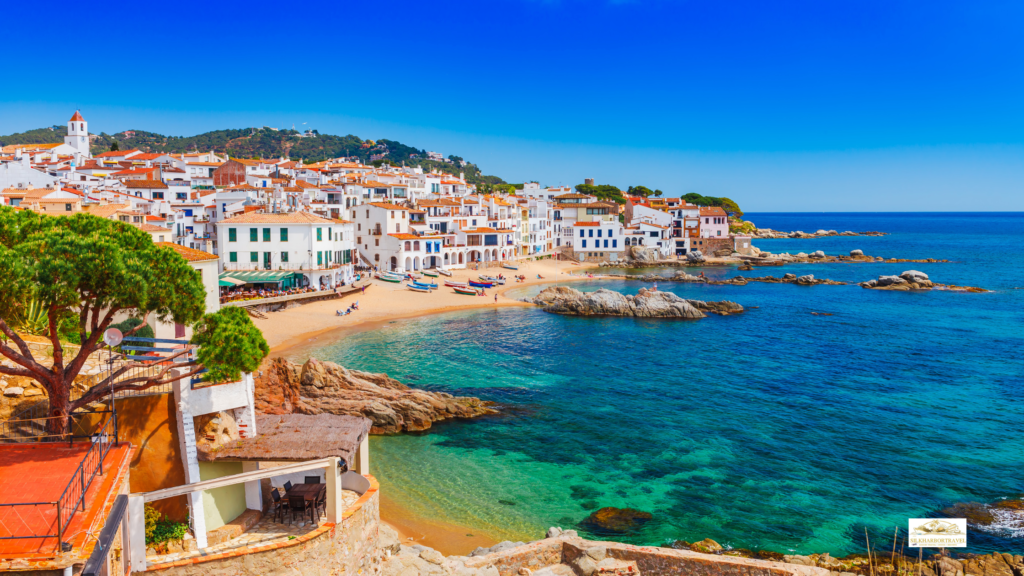 Barcelona, Spain coastline with many buildings and houses along the waterfront, illustrating best mediterranean cruise itineraries.