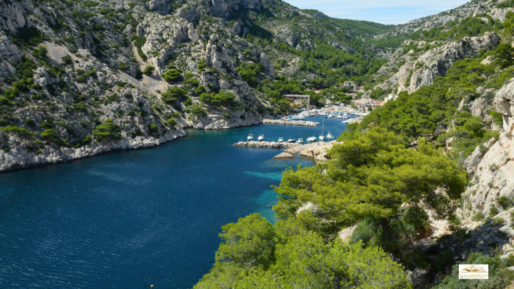 Scenic Calanque de Morgiou near Marseille, France, with cliffs and blue water, illustrating best mediterranean cruise itineraries.