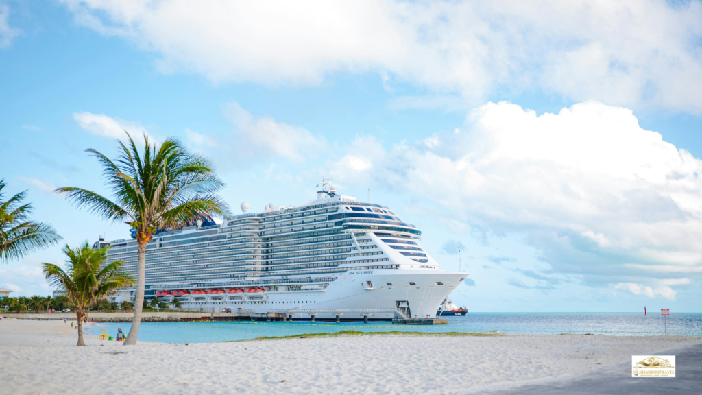 Luxury cruise ship docked in the Bahamas with turquoise water and a bright tropical skyline