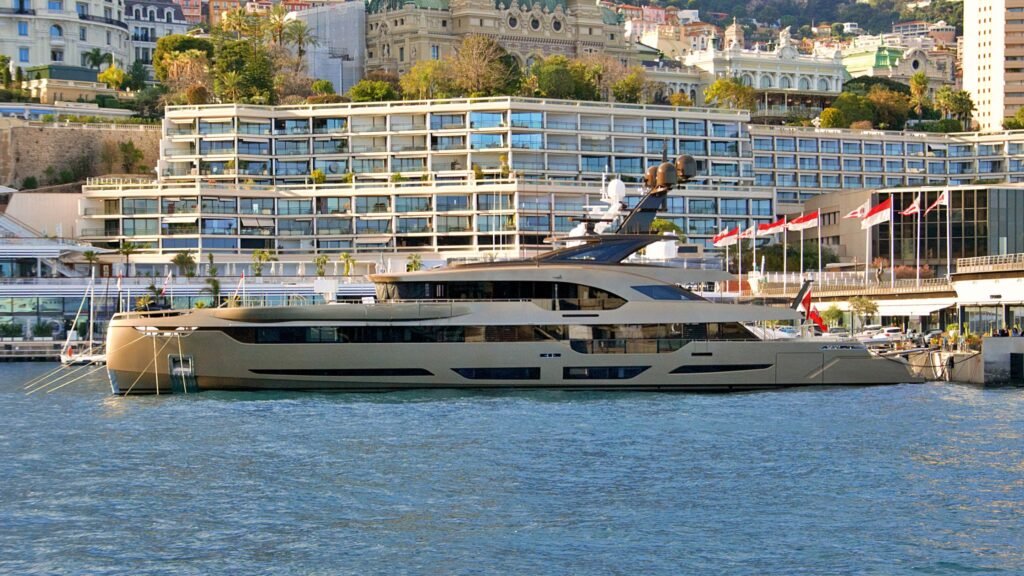 Luxury yacht in Monaco harbor for private yacht charter basics