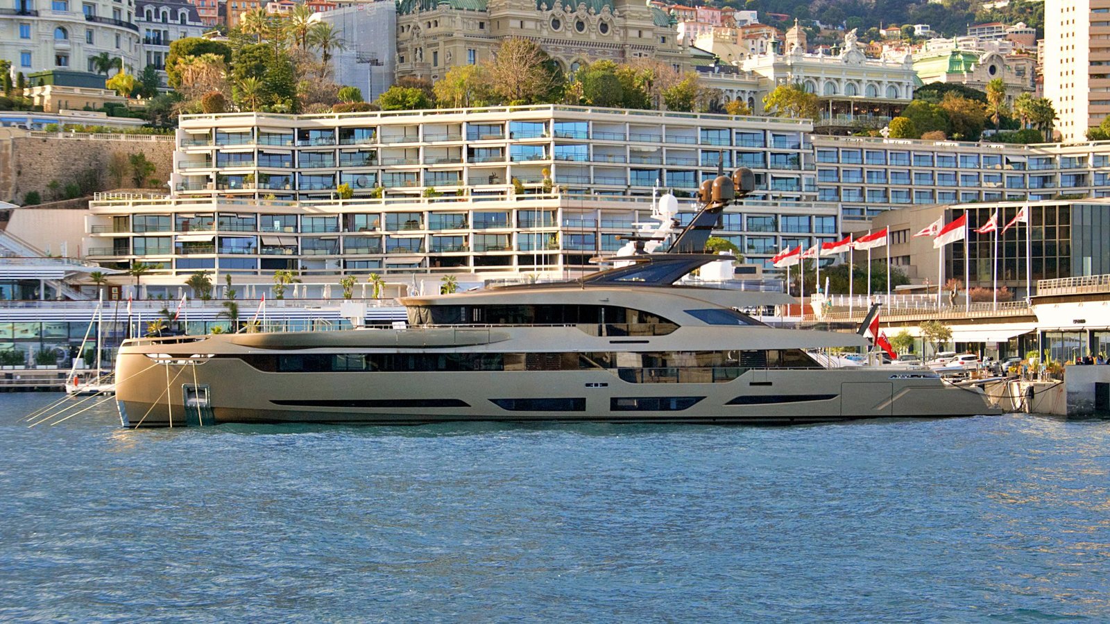 Luxury yacht in Monaco harbor for private yacht charter basics