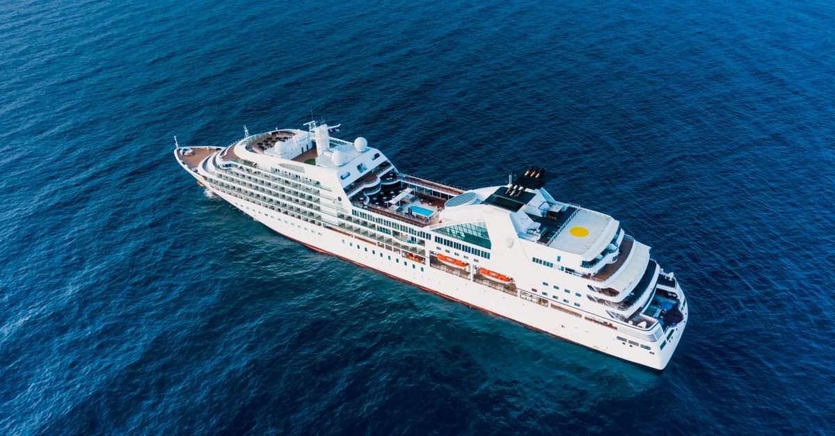 A large cruise ship seen from above at sea
